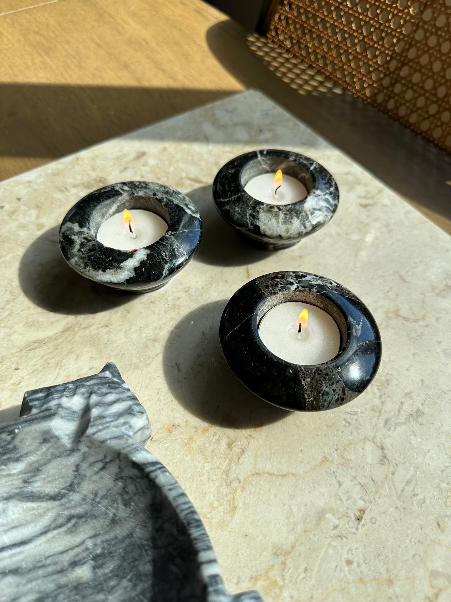 Three black marble tealight holders