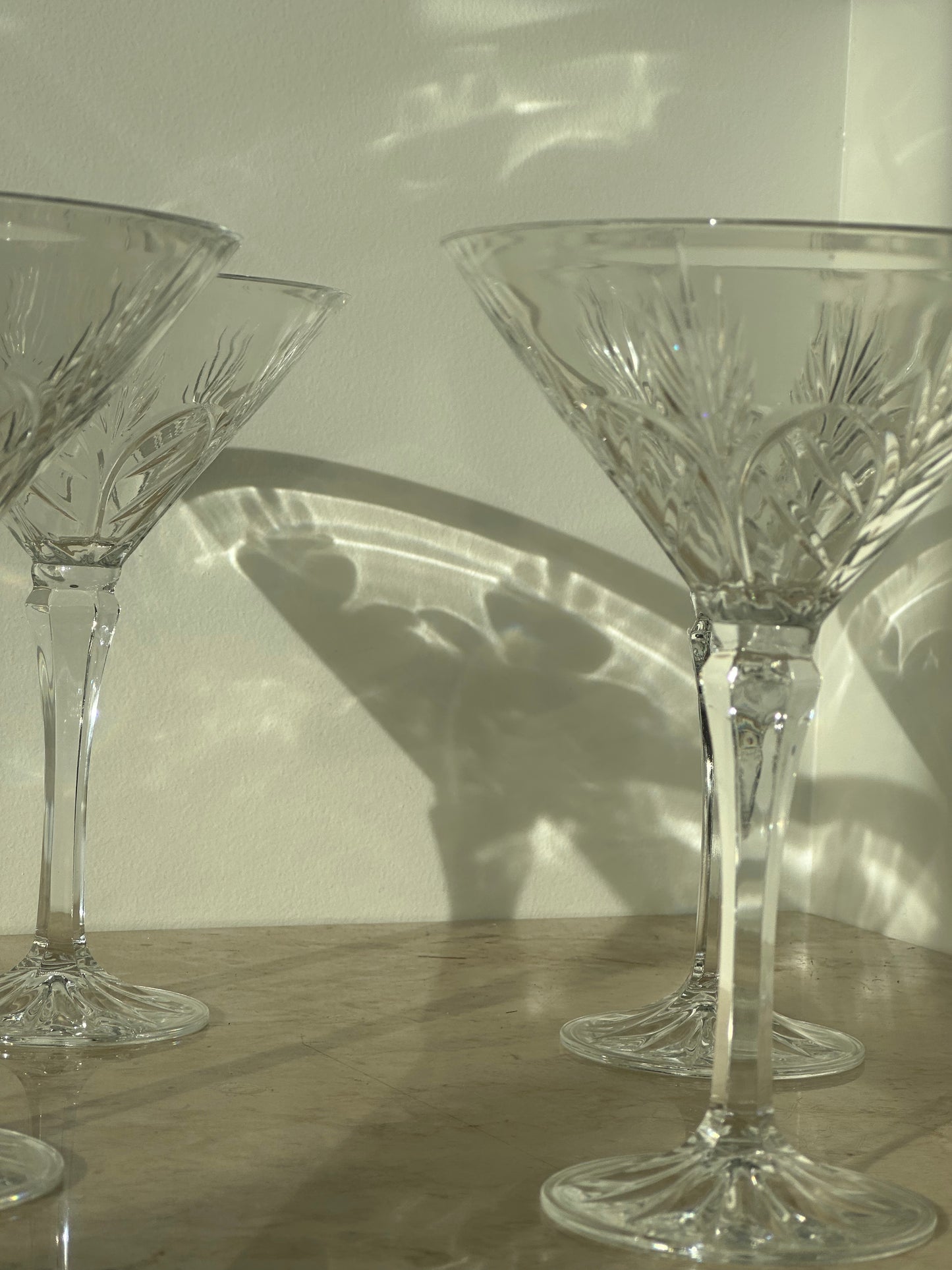 Four crystal martini glasses