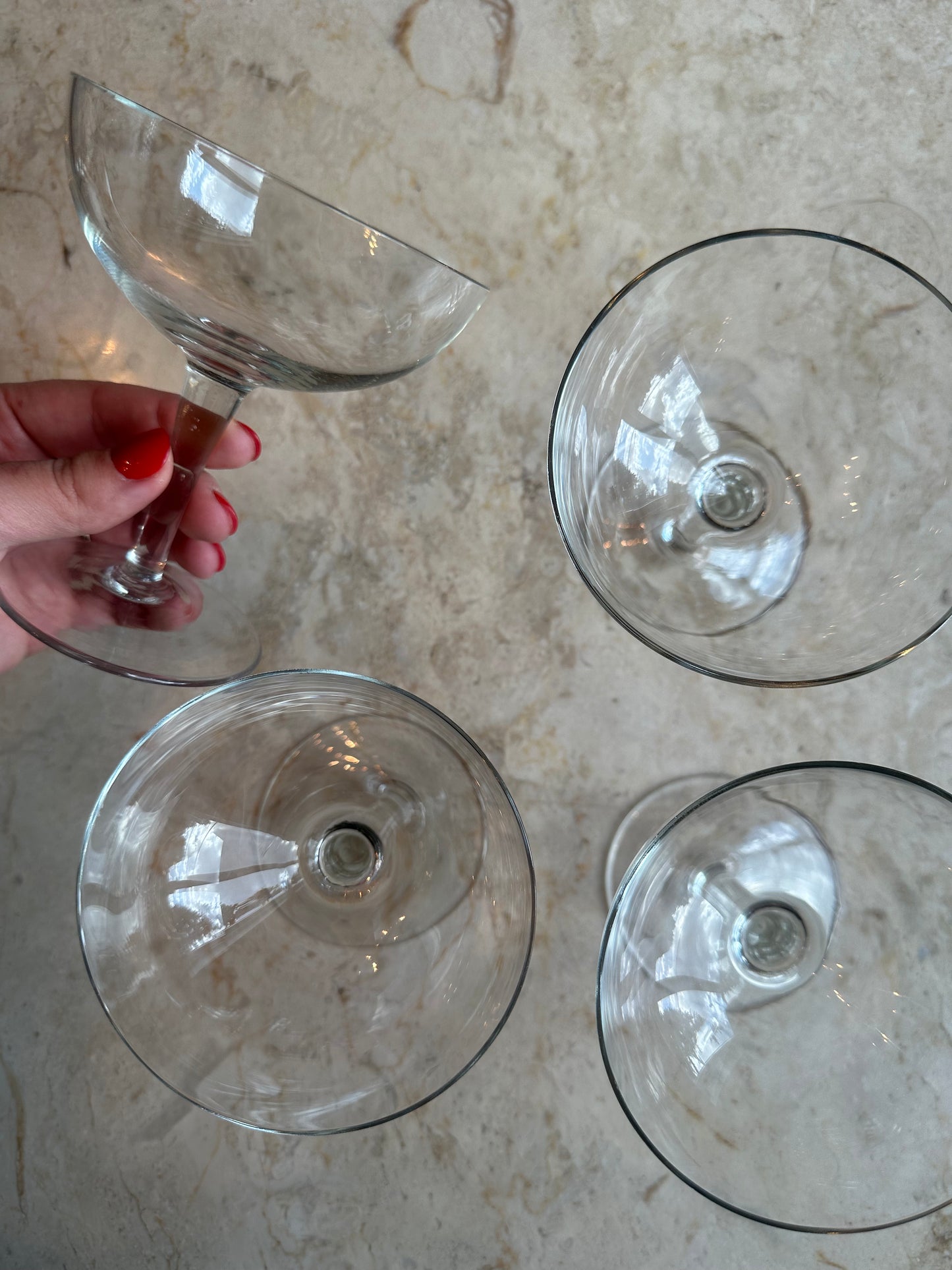 Four coupe glasses