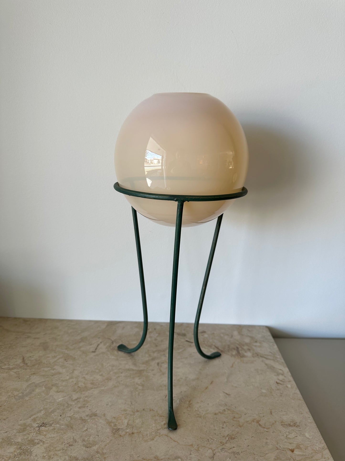 Glass round vase on stand