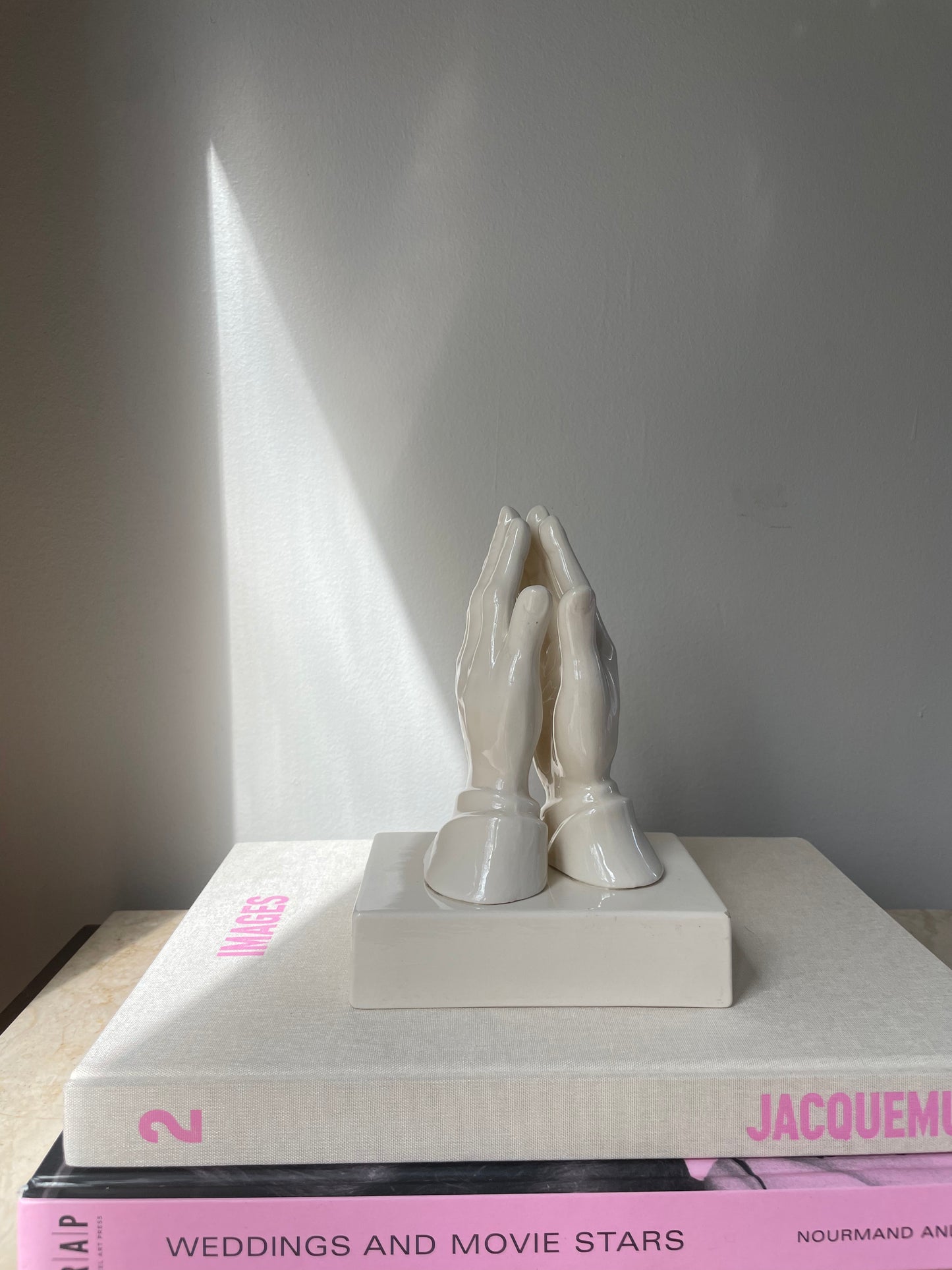 Praying hands sculpture