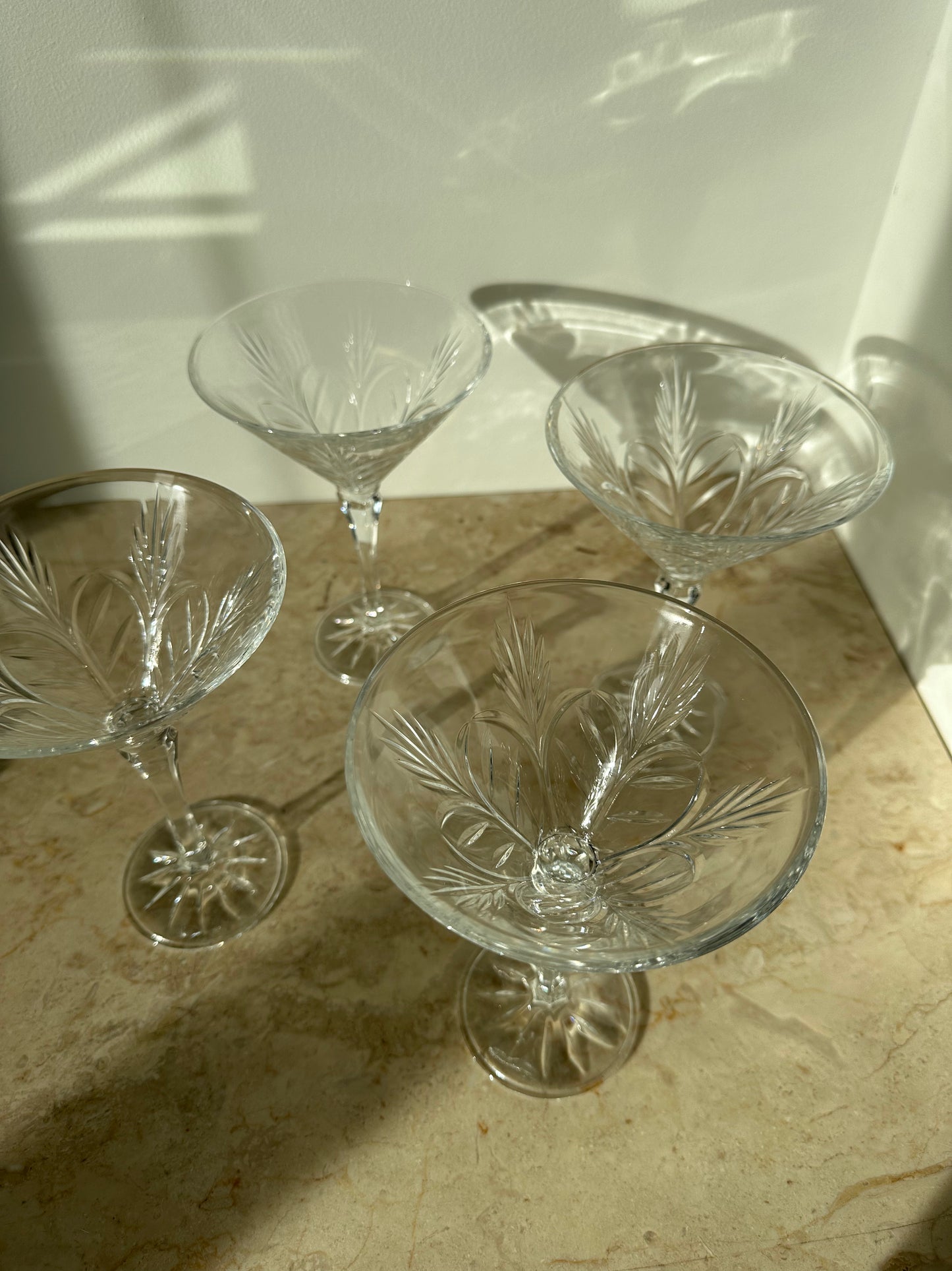 Four crystal martini glasses