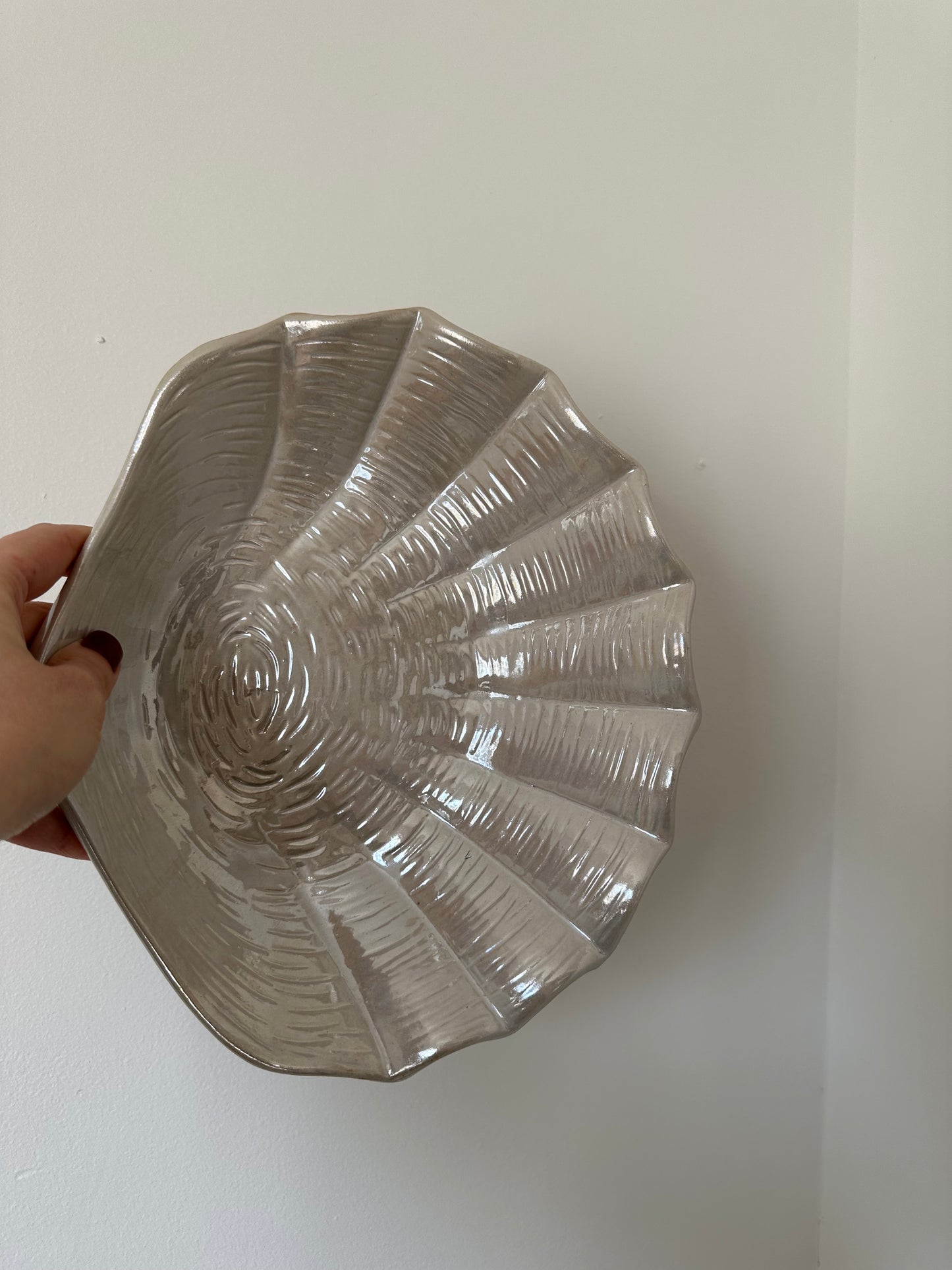 Ceramic shell plate