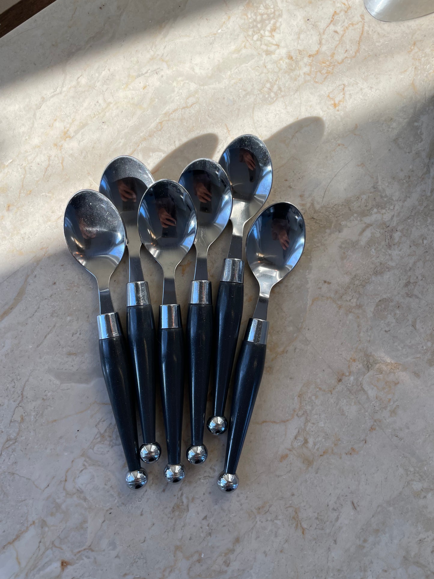 Six dessert spoons