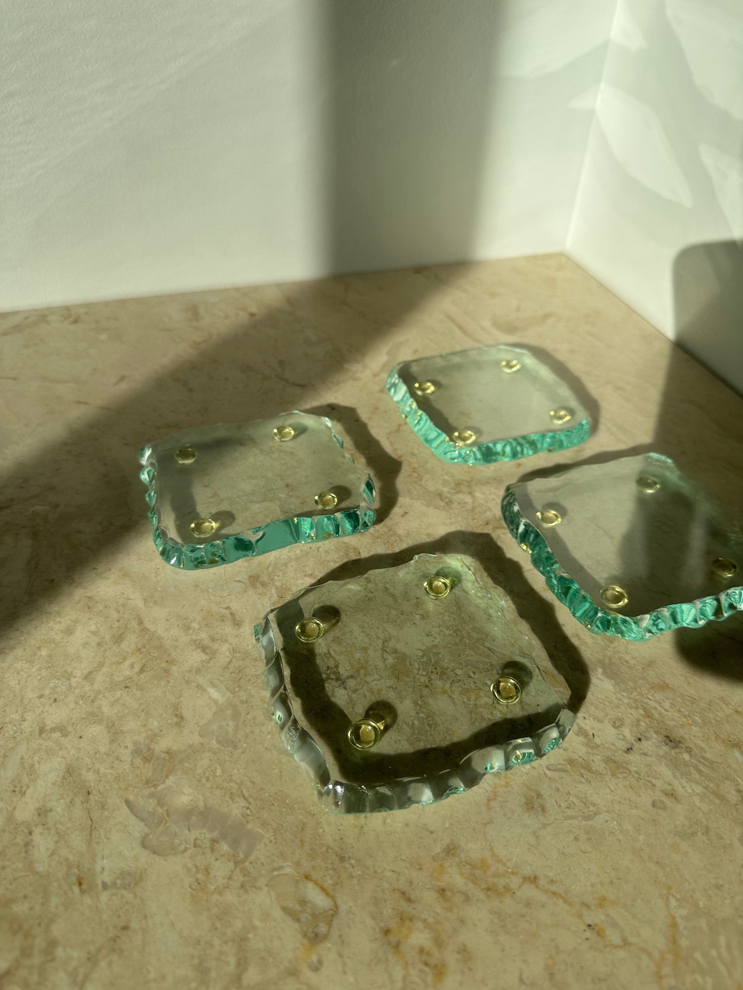 Four glass coasters