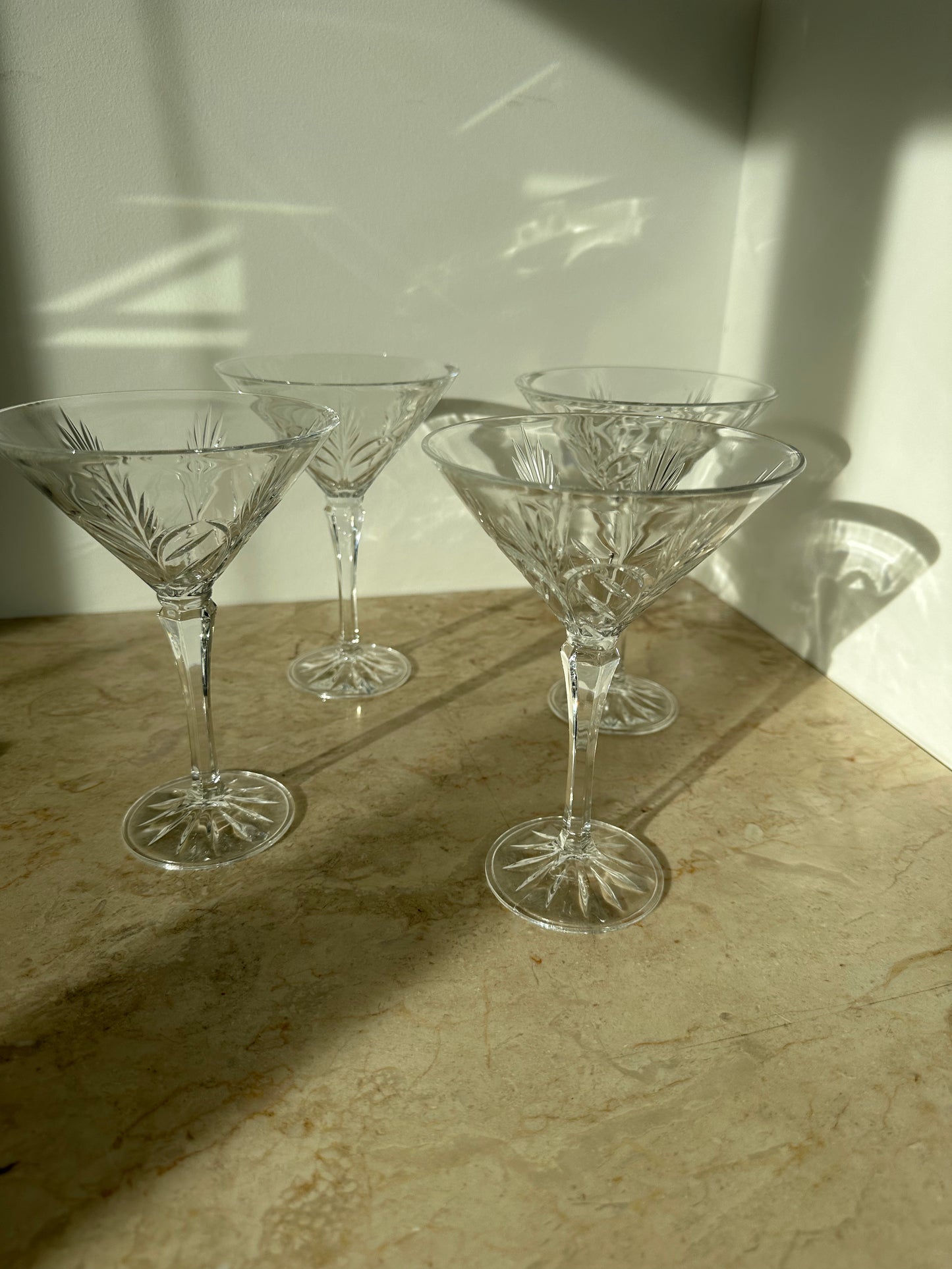 Four crystal martini glasses