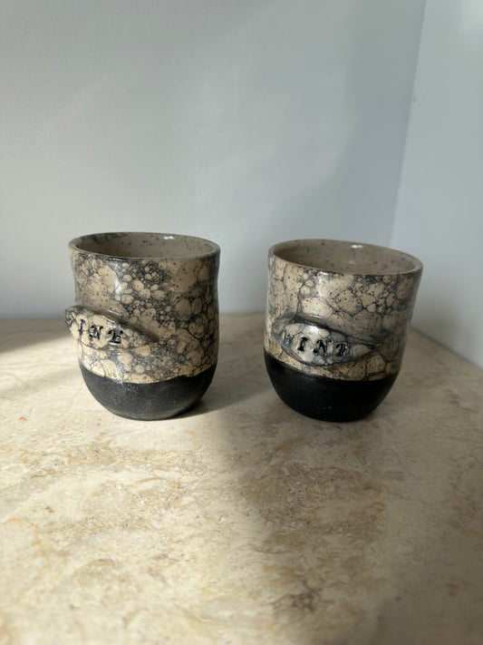 Two ceramic wine cups