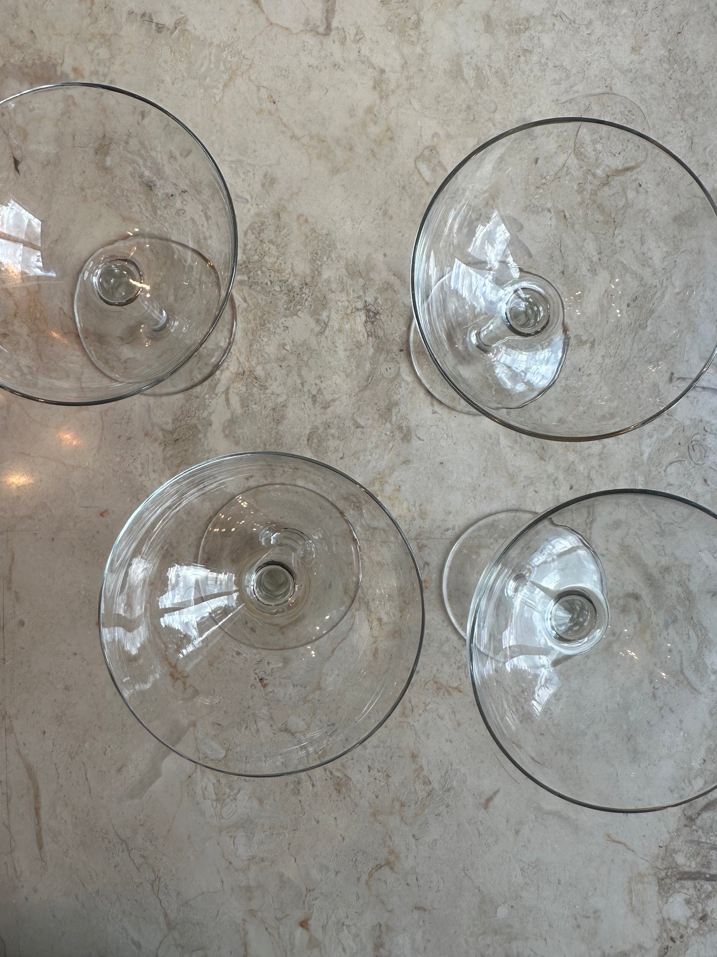 Four coupe glasses