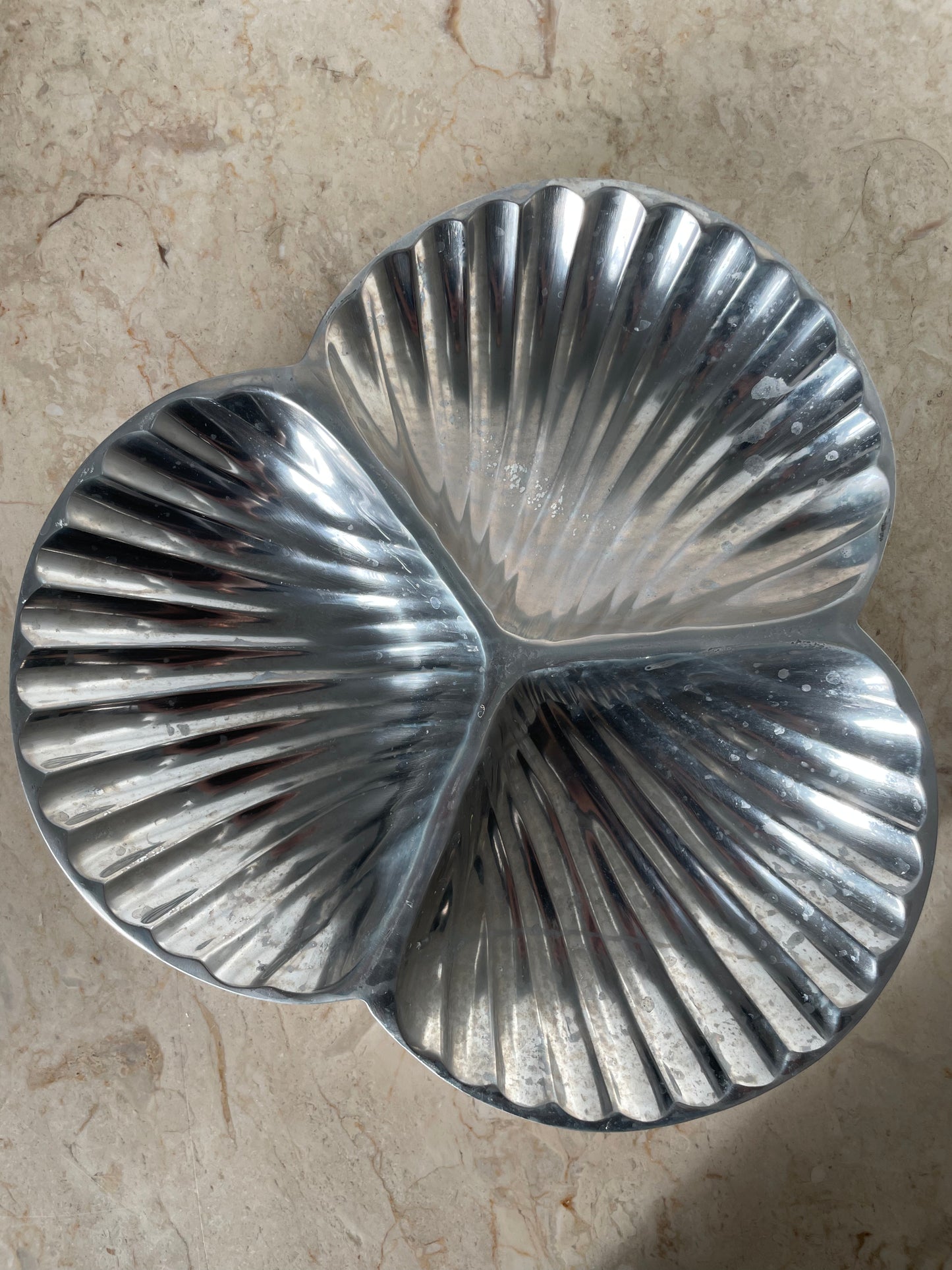 Large silver shell plate